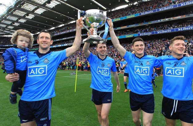 Denis BAstick, Cormac Costello, Diarmuid Connolly and Paul Flynn celebrate after the game