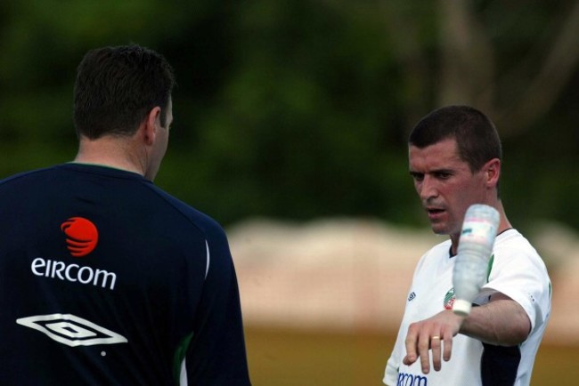 Roy Keane throws a bottle of water away