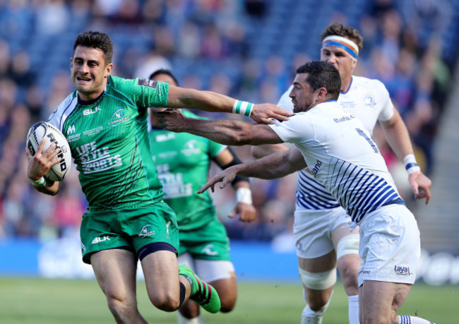 Tiernan O'Halloran beats Rob Kearney to score a try