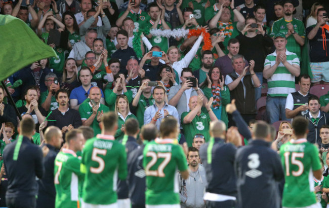 Republic of Ireland players applaud the supporters