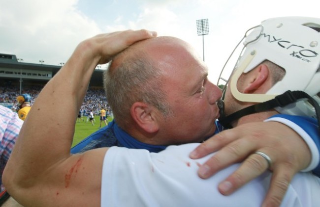 Derek McGrath celebrates winning with Jamie Barron