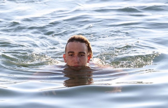 Ultan Dillane in the water