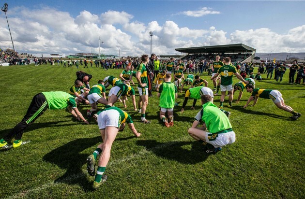 Kerry players warm down in front of their supporters