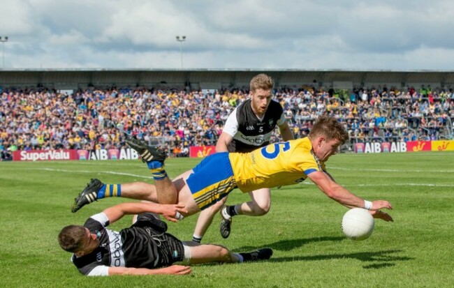 Sean Mullooly with Keelan Cawley and Adrian McIntyre