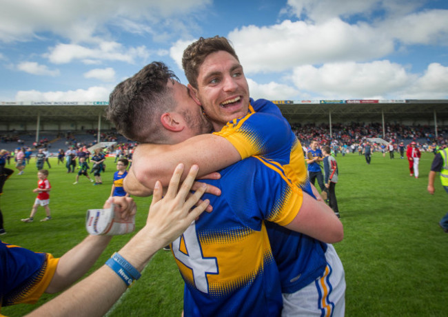 Michael Quinlivan and Philip Austin celebrate