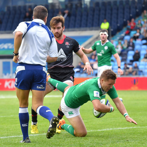 Johnny McPhillips scores his team's second try