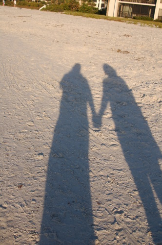 Holding_Hands_shadow_on_sand