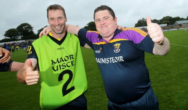 David Power and Mattie Forde celebrate at the final whistle