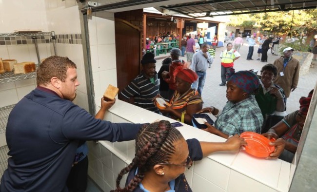 Sean Cronin gives out food