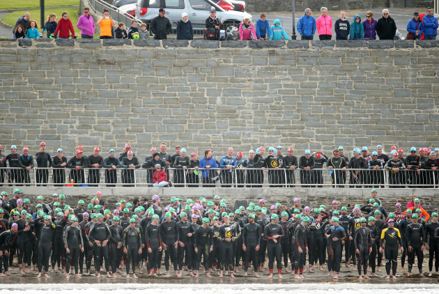 Spectators watch on as club athletes prepare for the start of the race