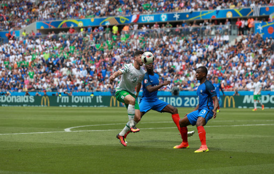 Shane Long with Patrice Evra