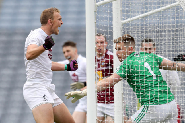 Tommy Moolick celebrates scroing their first goal