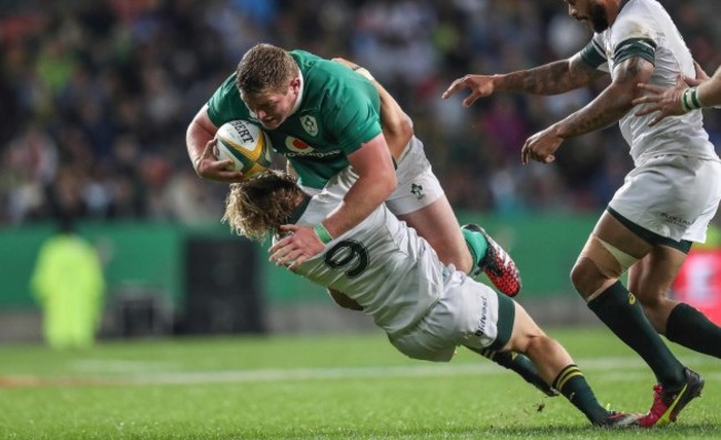 Tadgh Furlong is tackled by Faf de Klerk