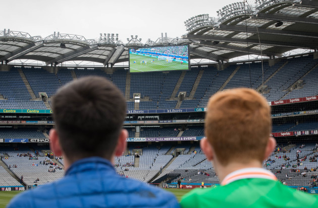 Fans keep an eye on the Ireland v France game