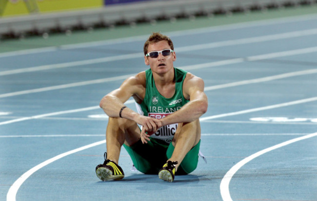 David Gillick sits on the track after finishing in 5th place