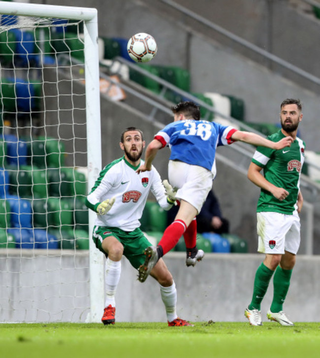 Paul Smyth puts his header over the bar