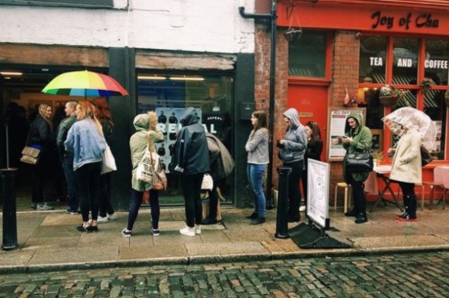 Queuing to buy REPEAL sweatshirts in Indigo & Cloth