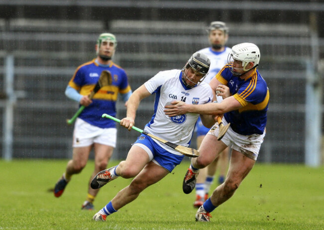 Jake Dillon in action against Michael Breen
