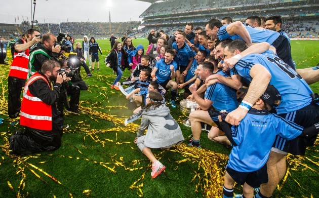 Dublin players celebrate with the Sam Maguire cup