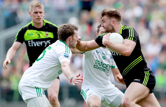 Declan McCusker and Damian Kelly with Aidan O’Shea