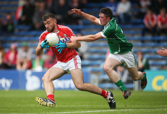 Peter Kelleher is tackled by Stephen Cahill