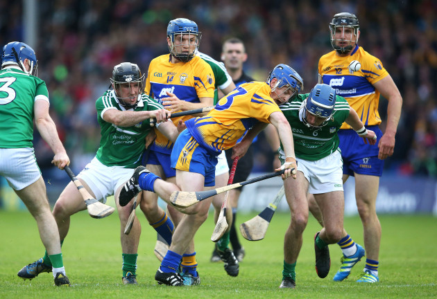 Podge Collins under pressure from Darragh O'Donovan and Gavin O'Mahony