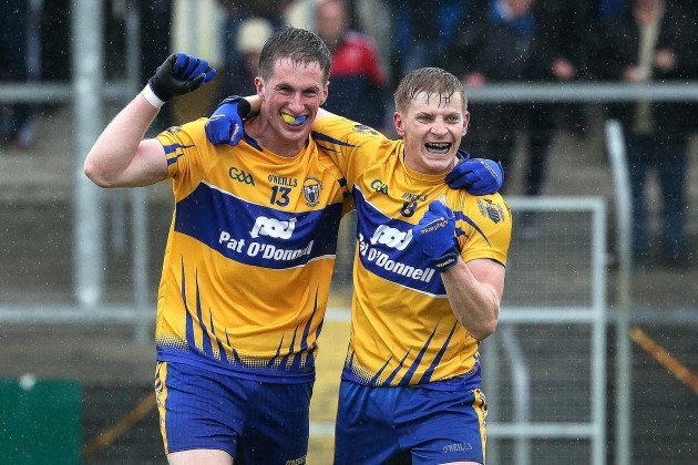 Eoin Cleary and Padraic Collins celebrate at the final whistle