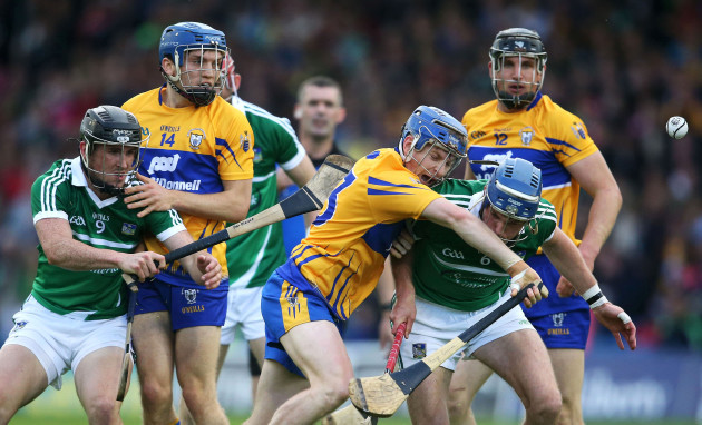 Podge Collins under pressure from Darragh O'Donovan and Gavin O'Mahony