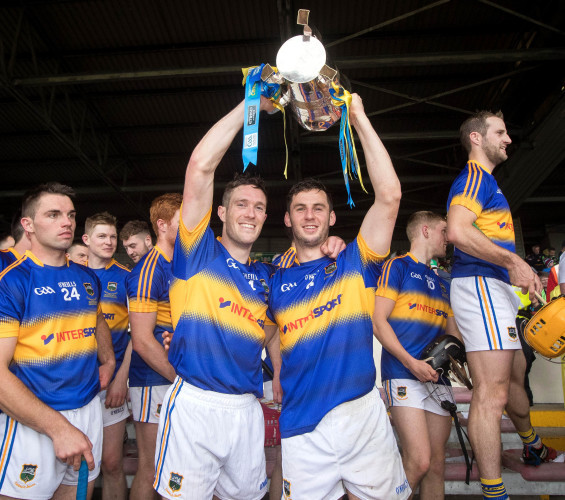 Cathal Barrett and Michael Cahill celebrate with the trophy