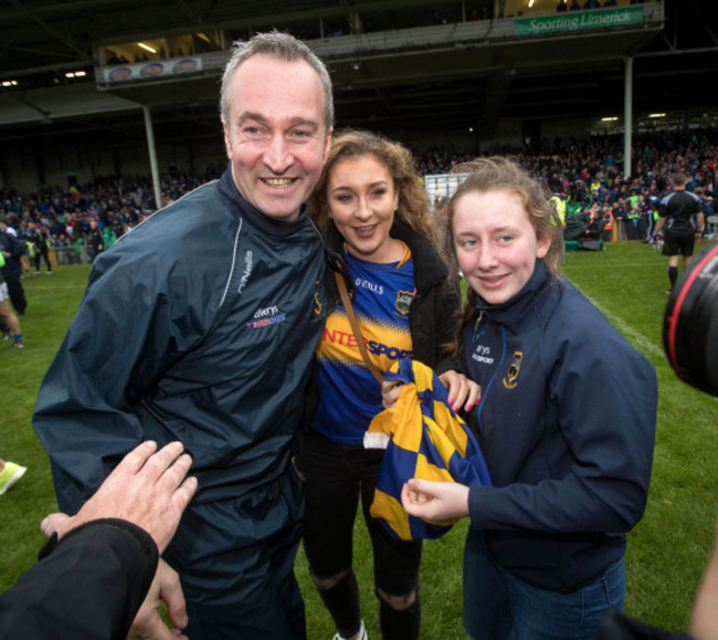 Michael Ryan celebrates with his daughters