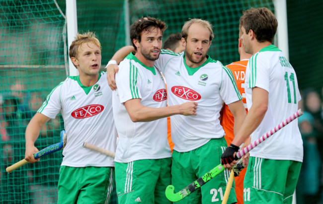 Michael Watt, Timothy Cockram and John Jermyn celebrates with goalscorer Chris Cargo