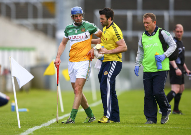 Cathal Parlon leaves the pitch injured