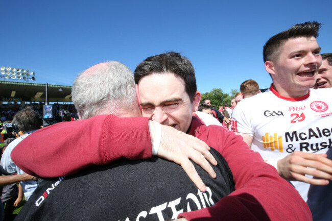 Mickey Harte celebrates with his son Mark at the final whistle