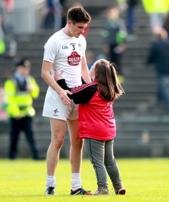 David Hyland consoled by a fan after the game