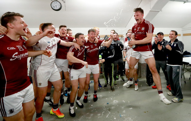 Eoghan Kerin celebrates with his team after the game