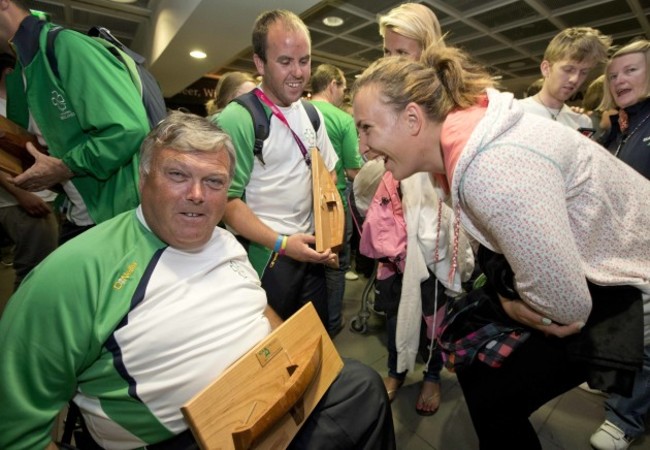 John Twomey shares a joke with Olympic sailor Analise Murphy