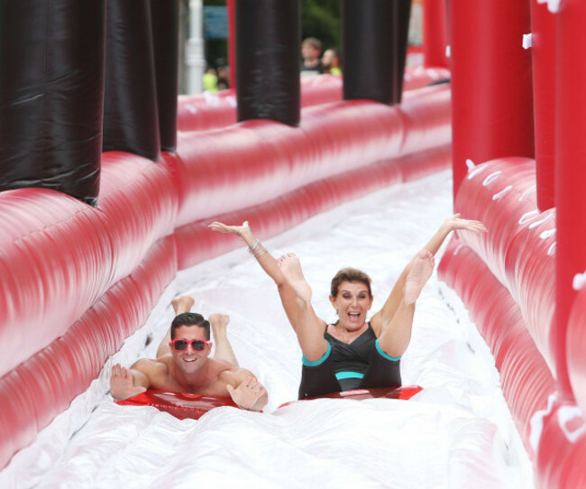 14 NO FEE Linda Martin & Cormac Branagan make a big splash with HB Ice Cream at the 98FM Big Slide Home