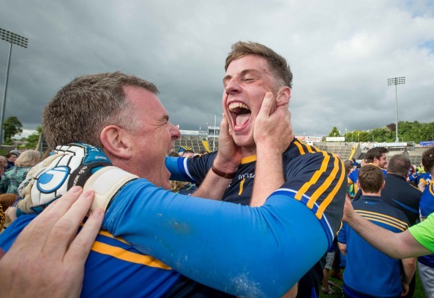 Liam Kearns celebrates with Evan Comerford