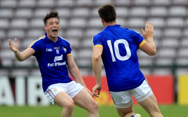 Jamie Malone celebrates his goal with Keelan Sexton