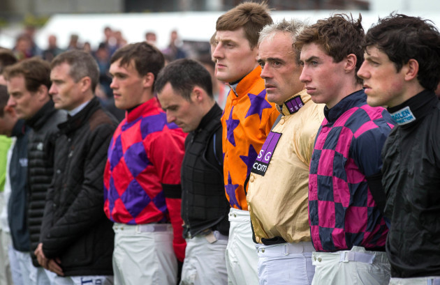 Ruby Walsh stands with fellow jockeys for a minutes silence in memory of JT McNamara