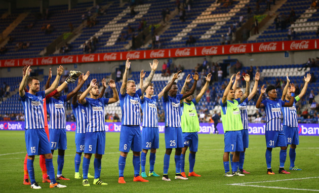 Genk players wave to their fans