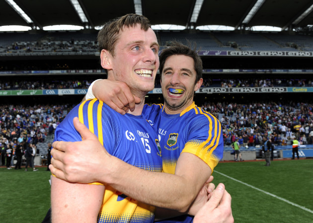 Conor Sweeney and Martin Dunne celebrate at the end of the match