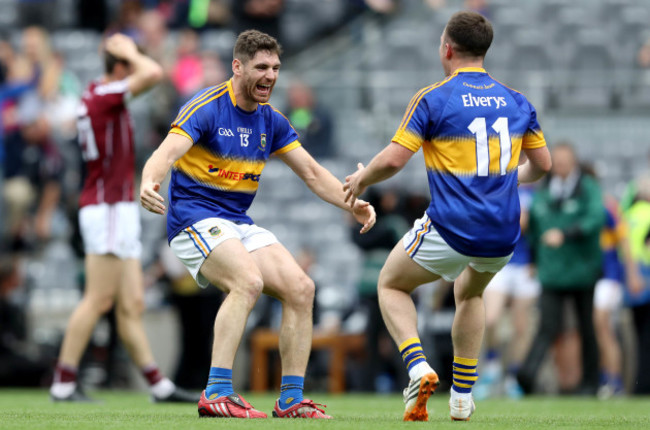 Philip Austin and Kevin O'Halloran celebrate at the final whistle