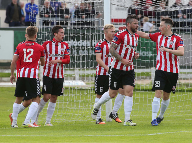 Rory Patterson celebrates scoring with teammates