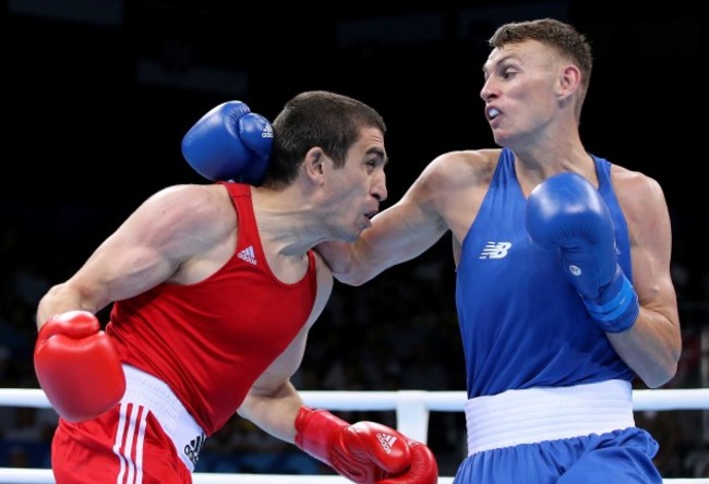 Sean McComb  in acton against Albert Selimov