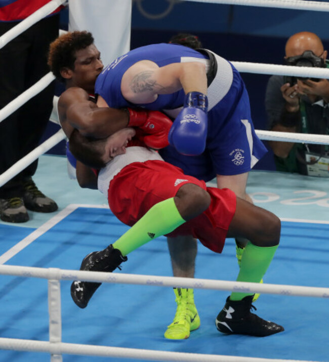 Ireland's Joe Ward with Carlos Andres Mina