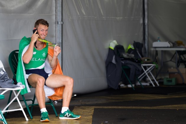 Gary O'Donovan phones home after winning a silver medal with his brother Paul O'Donovan