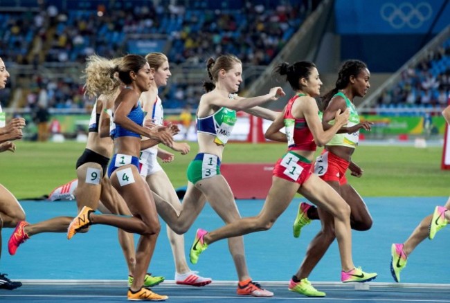 Ciara Mageean narrowly avoids a stumble on her way to finishing second and qualifying for a semi-final