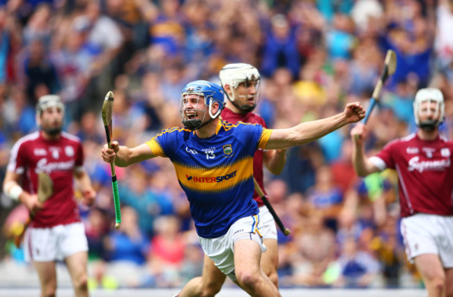 John McGrath celebrates scoring a goal