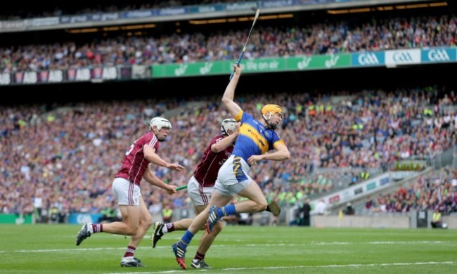 Seamus Callanan with Gearoid McInerney and Daithi Burke